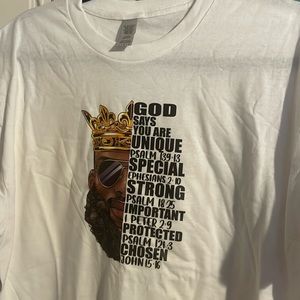 A large, white “God says” male t- shirt.